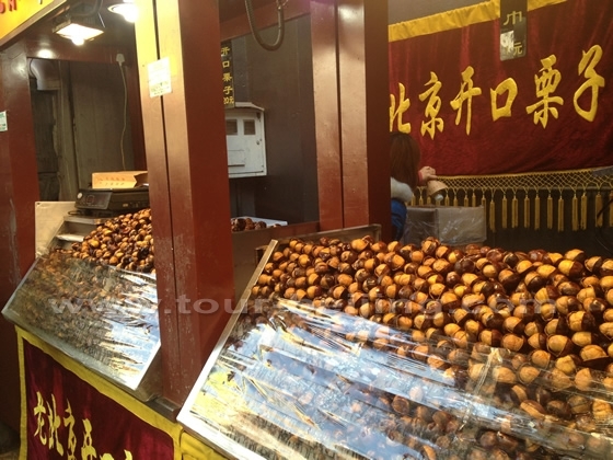 A food vendor selling the fried chestnuts