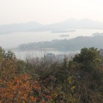 A glimpse of West Lake below in a haze