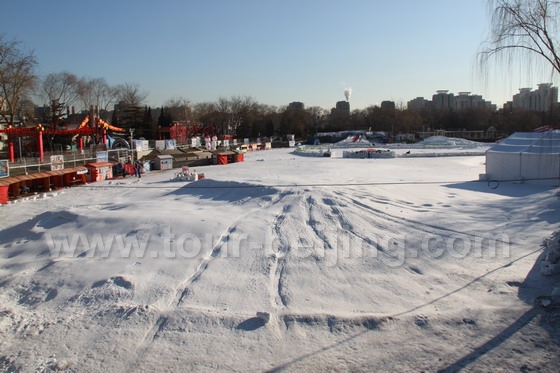 A lake turned ice and snow playground just behind the north gate of Longtan Lake Park