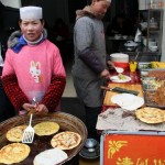 A street - front store selling fried pies.