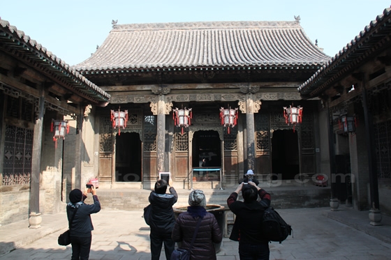 A typical Chinese courtyard building with fine and exquisite wood and stone carvings.