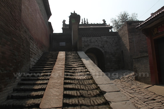 Ascending the stone steps inside the south gate takes you to the Khan Temple.