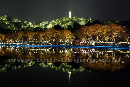 Baoshu Pagoda atop the Precious Stone Hill with its reflection on the water