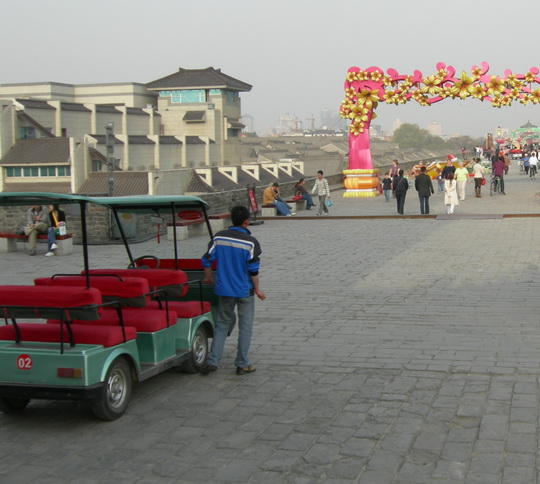 Taking a buggy around Xian City Wall