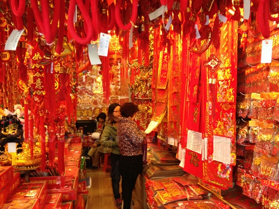 Buried in the red sea of Chinese new year decorations
