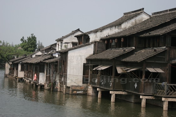 Many building protrude above the water