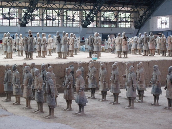 More Terra Cotta soldiers standing in rows that are under repair in Pit 1