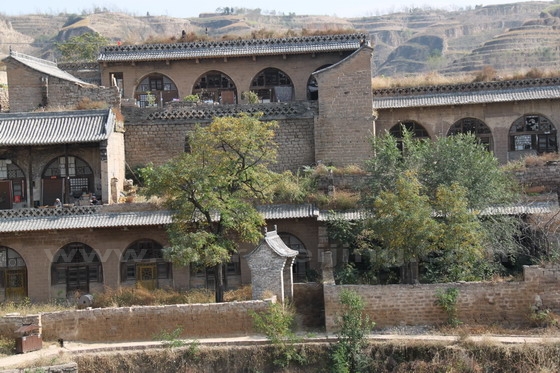 Multi-level layers of cave houses with courtyards