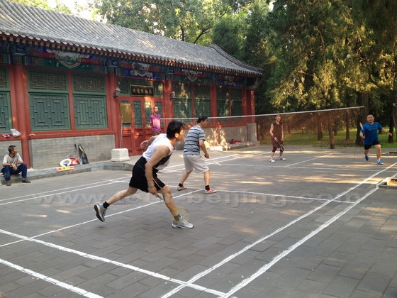 Playing badminton by the side of the Sun Altar Museum