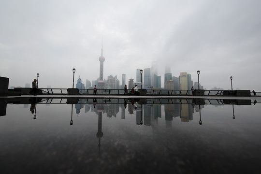 Rainwater reflections of Pudong Skyline on the Bund （1）