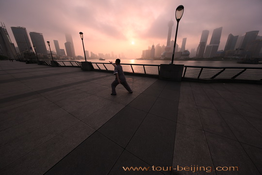 Playing Tai Chi on the Bund with Sunirse over Pudong Skyline