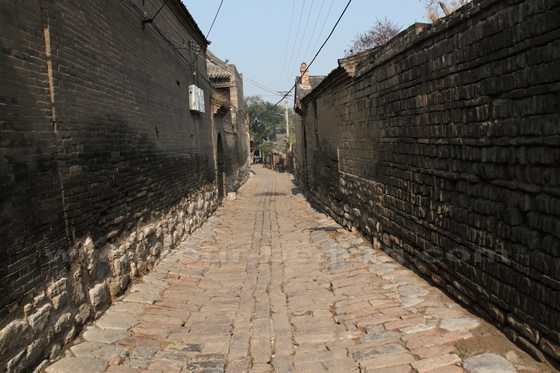 The 300 meters long cobble stoned street is the main street in the village