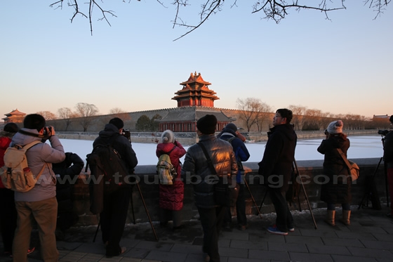 The Northwest Turret in sunset glow after snowing in Beijing