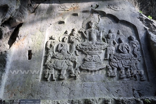 The Rock Carving of Locana Buddhist Ceremony at the entrance
