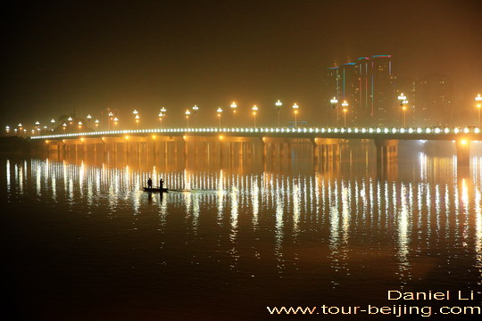 The brightly lit Qingyi River Bridge
