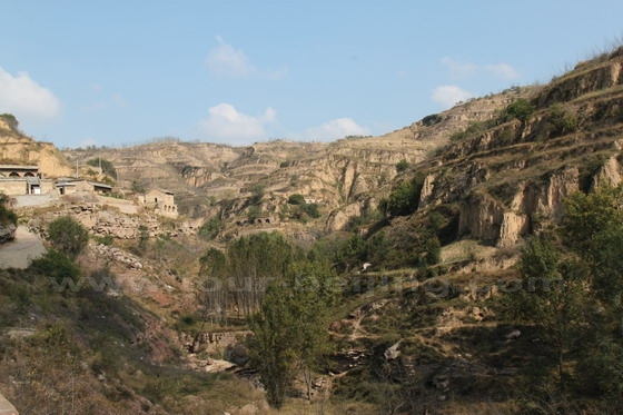 The cave dwellings are built on the both sides of the valley at Lijiashan Mountain
