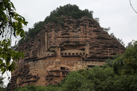 The grottoes on the east side of the cliff