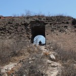 The path leading to the entrance to the Wild City is overgrown and crumbling