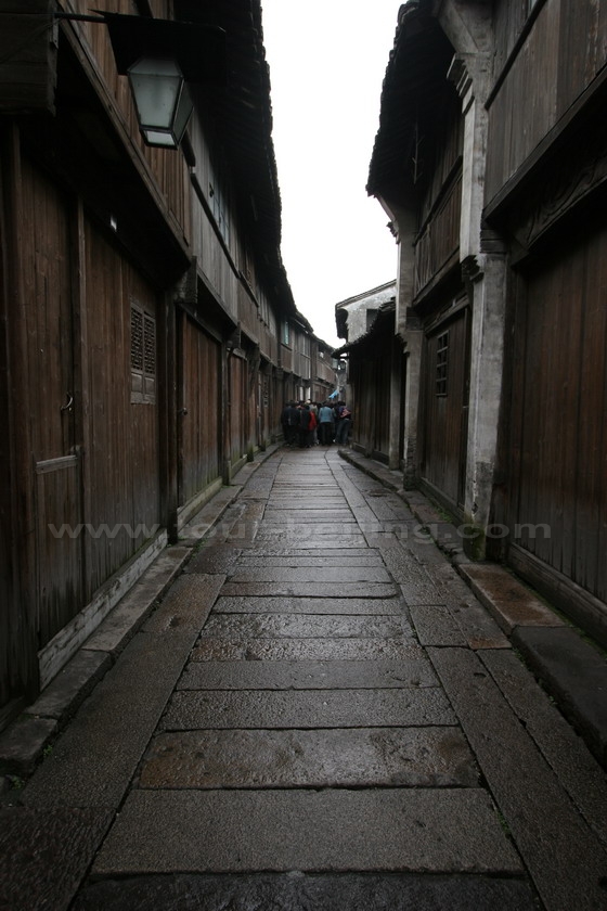 The slab paved street flanked by the old wooden houses in Wuzhen.