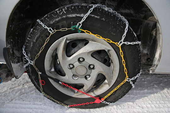 The snow chain is on the van now