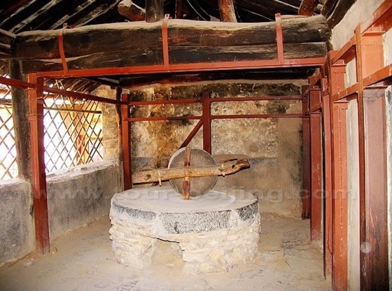 The town’s mill stone is used for flour