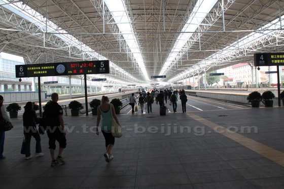 Walking to the platform where a S train is waiting for passengers to go to Badaling Great Wall.