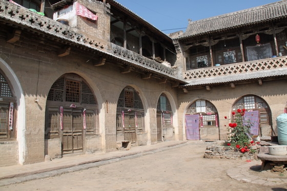 We are inside the courtyard of the cave house