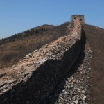 We are walking on the wild and damaged wall to the first fort on the west section.