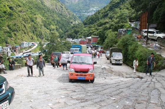 We had to stop and get off our bus about 200m away from the Zhangmu Fort and the people had to carry all their belongings to the fort.