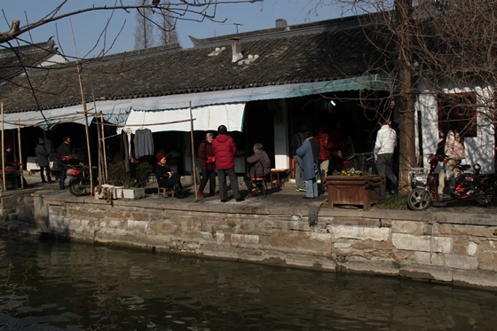 Zhujiajiao Water Town is still inhabitted by the local residents doing routine life.