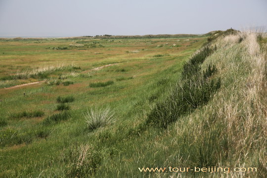 The grassy mound that was once the city wall.