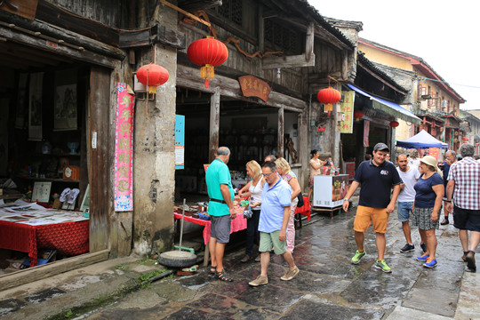 every much intrigued by the ancient Chinese houses and handicrafts .