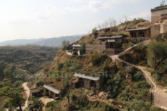 the cave dwellings on the west side of the valley