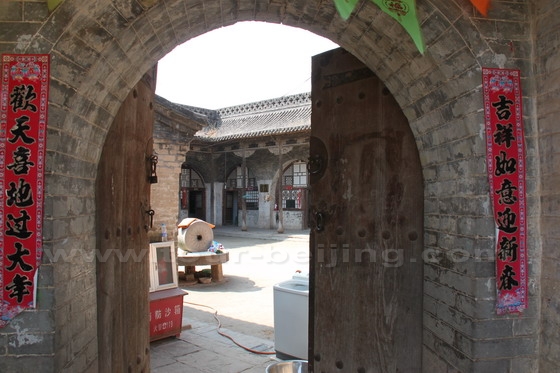 the old wooden door is open for you to visit