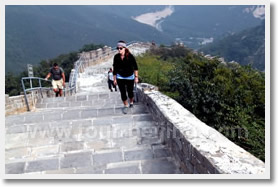 We walk up along the stone paved steps