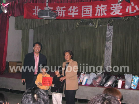 We made cash donation RMB 3000 and also gave some clothes