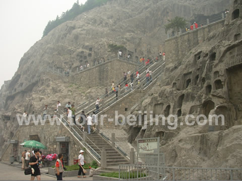 Tourists were climbing up the Longmen Grottoes