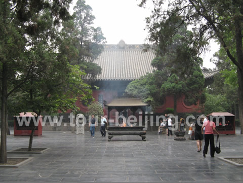 This is one of the halls in White Horse Temple. The temple and cypresses on both sides make divine atmosphere