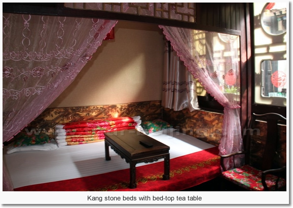 Kang stone beds with bed-top tea table