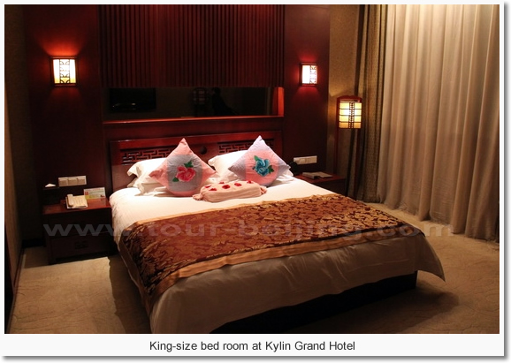 King-size bed room at Kylin Grand Hotel