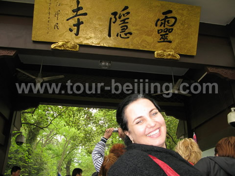 Pose before the entrance to Linying Temple