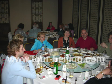 People are enjoying their dinner at Hantang Era Restaurant