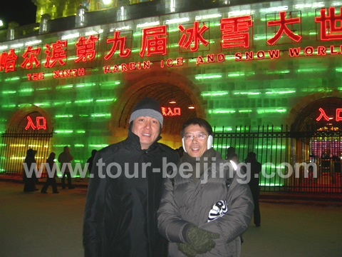 With Xiao Ye from Cola Tours before the entrance gate to the Harbin Ice and Snow World