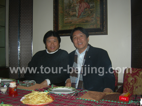 With CEO of Cola Tours - Mr. Wangke at the restaurant
