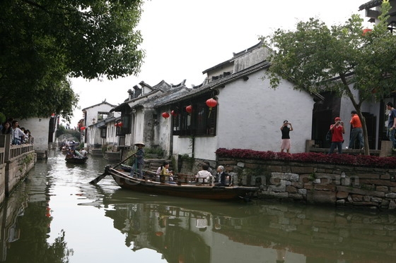 A boat ride offers people a close look at the historial houses and bridges