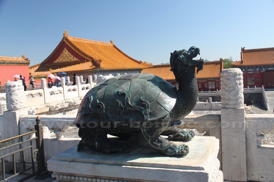 A huge mythical animal perched on the platform in front of Supreme Harmony