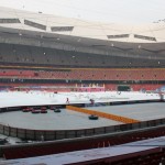 A ice rink on the man-made snow field.