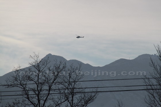 Flying over Badaling Great Wall and the mountains