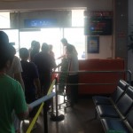 Passengers are going through the final ticket checking and leaving.