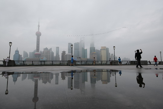 Rainwater reflections of Pudong Skyline on the Bund （5）